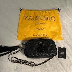 Nearly pristine Mario Valentino black leather camera bag